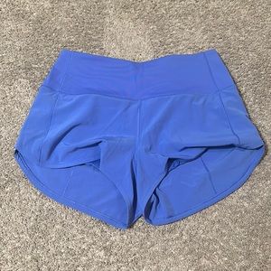 Blueish purple high rise speed ups 2.5” size 6